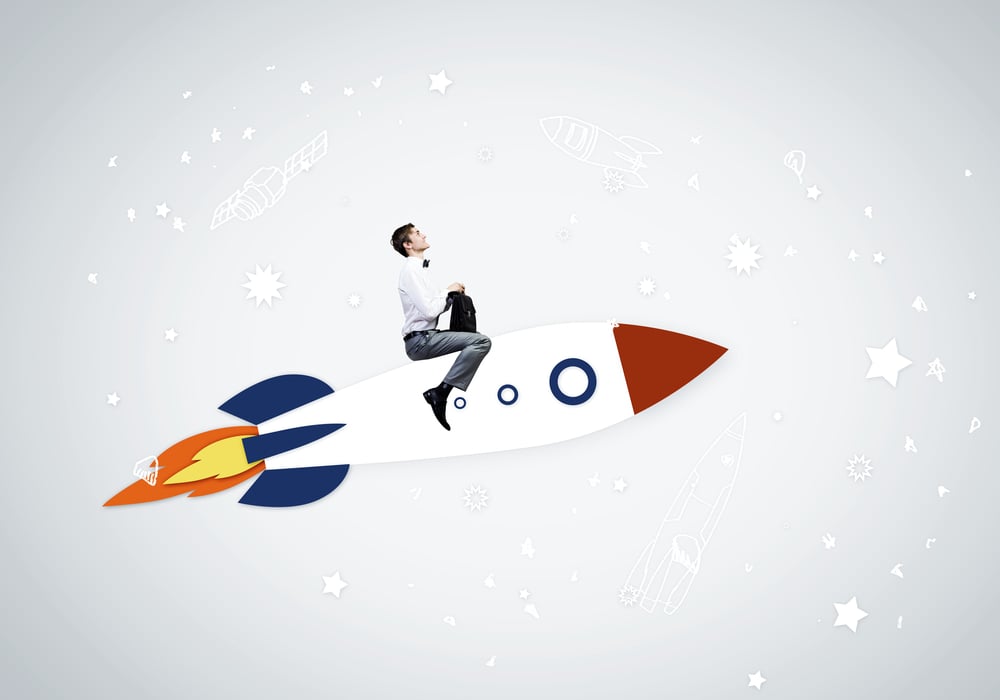 Young businessman,an flying in sky on drawn rocket