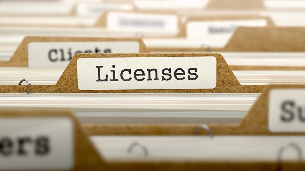 Licenses Concept. Word on Folder Register of Card Index. Selective Focus.